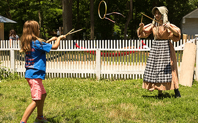 girls tossing hoops