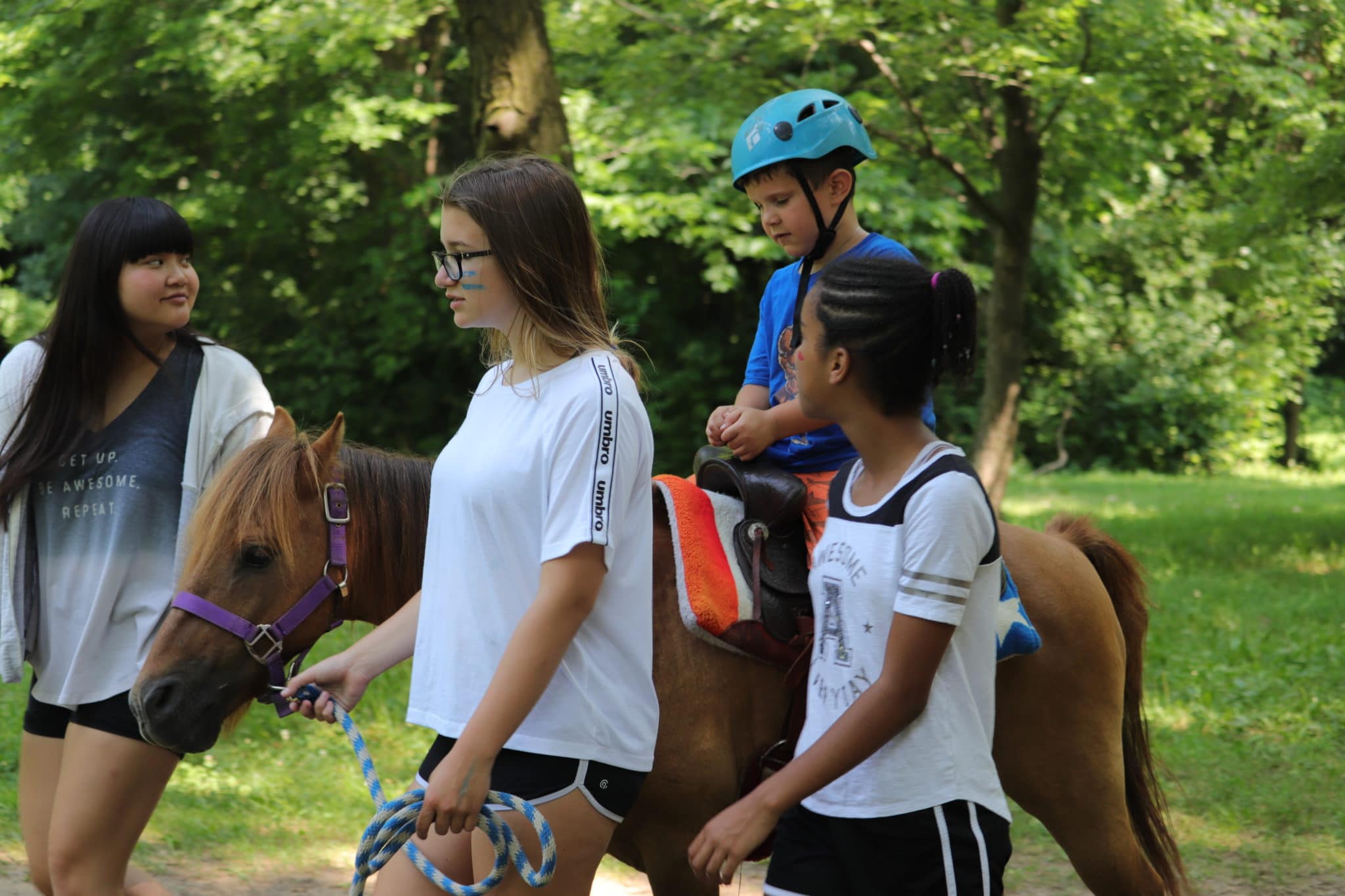 Horseback riding at summer camp
