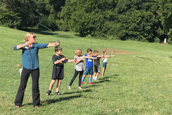 HSE Teacher-in-Residence Amy Murch teaches Archery to HSE 4th graders. Pre-Covid.