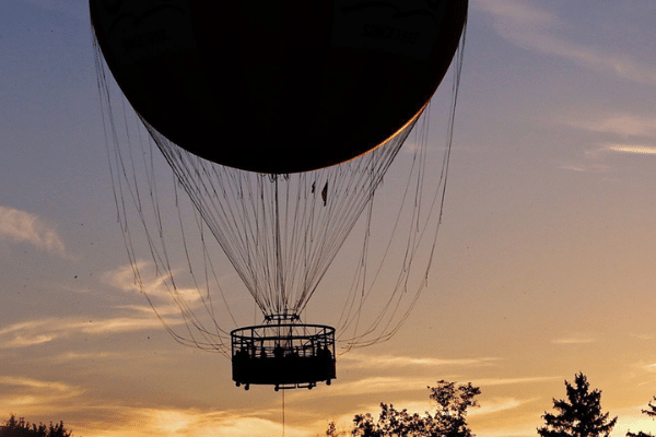 Silhouette of 1859 Balloon Voyage at Sunset