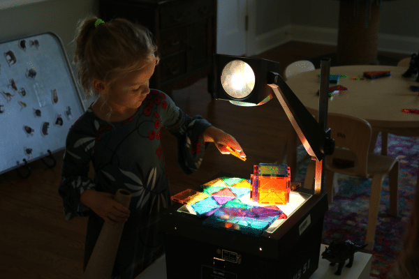 Student Using Colored Shapes on Projector