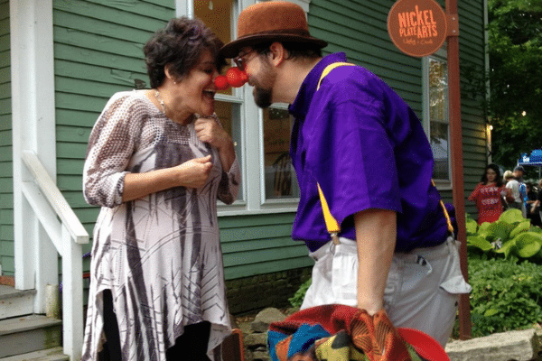 Clown and audience member interacting