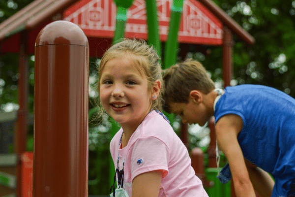 Girl playing at Ag Adventures playground