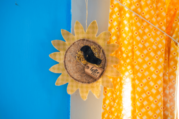 Hello Fall Sunflower Ornament Hanging In Window
