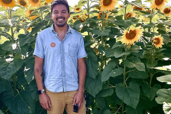 Conner Prairie Vistor in Sunflower Field