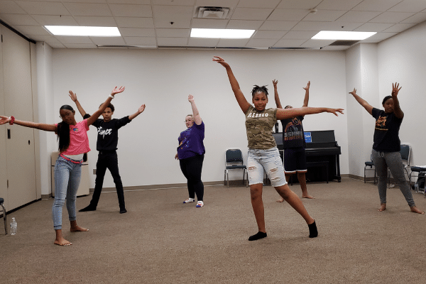 The Ensemble cast rehearses dance choreographed to music by legendary musician Fela Kuti.
