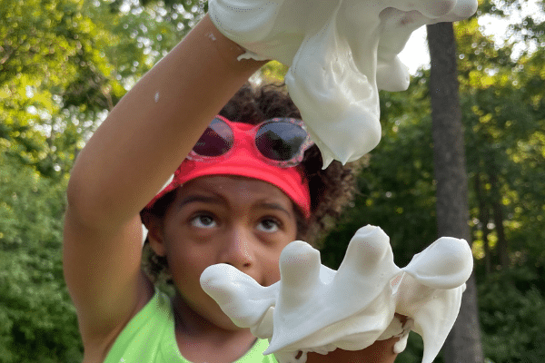 Preschool Student Playing With Shaving Cream Foam