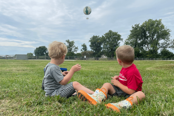 Preschool Students Watching The 1859 Balloon Voyage In Flight