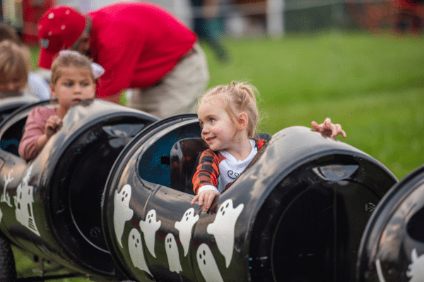 Children on barrel train ride at Headless Horseman