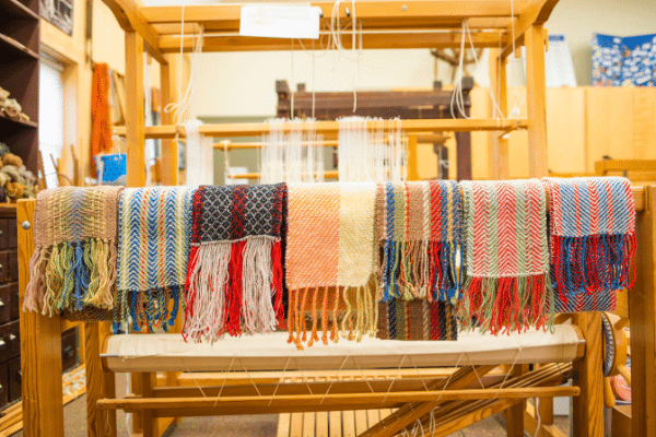 Seven handmade scarves