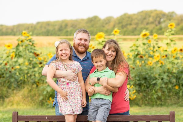 Family photo at Conner Prairie's sunflower field