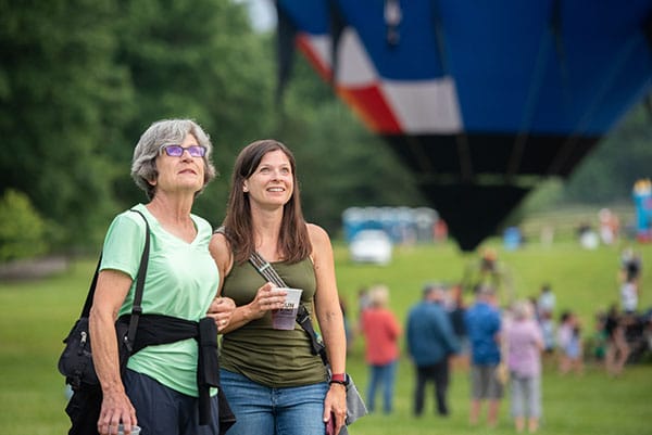 two adults at jupiter flights balloon glow