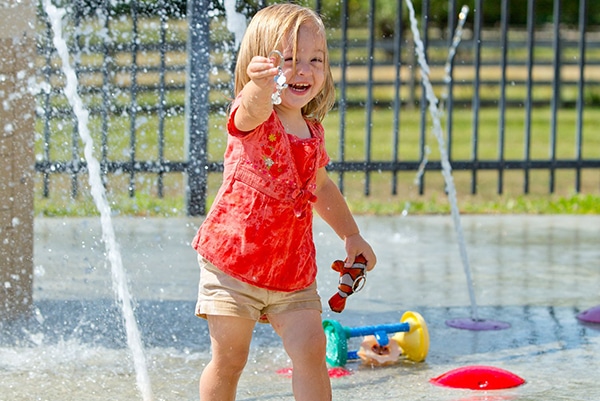 image of little girl in river crossing
