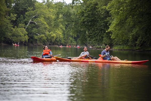 Image of three people in kayaks