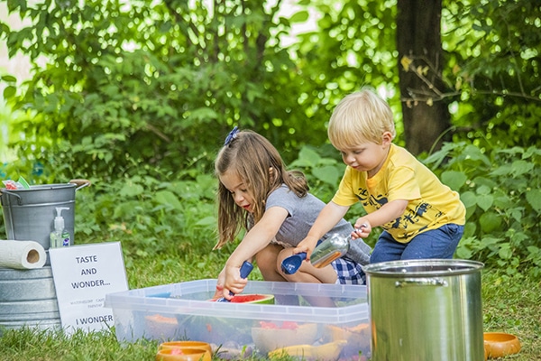 Children playing at playtime on the prairie -