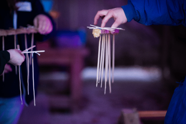 Candle dipping at A Merry Prairie Holiday