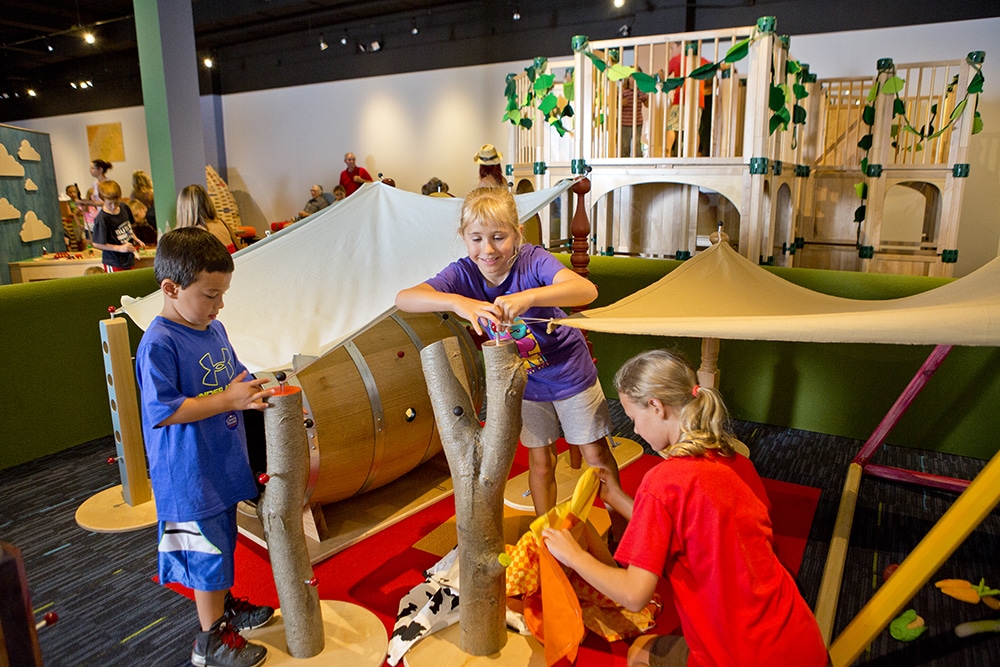 Children making a fort in Discovery Station