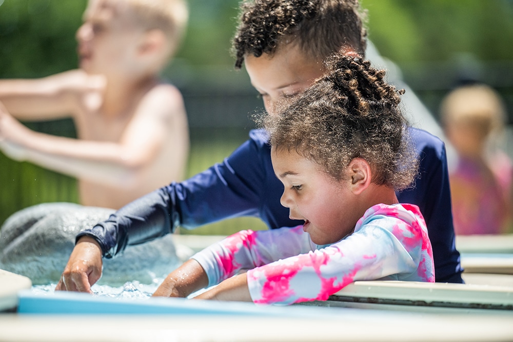 Children playing at River Crossing Splash Pad.