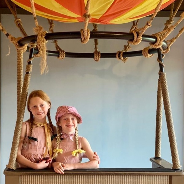 Children enjoying the 1859 Balloon Voyage exhibit