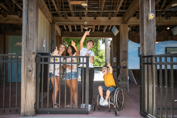 Children pointing up at the Balloon Voyage
