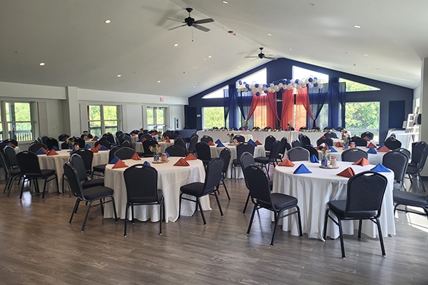 tables set up inside of a building