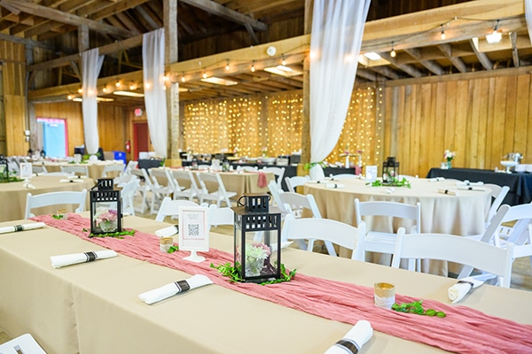 tables set up within a wooden building