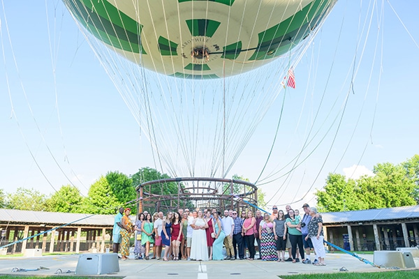 wedding party in front of the balloon