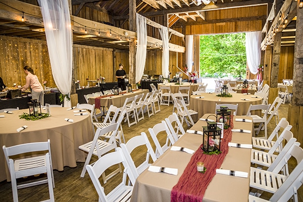 tables inside of a wooden building