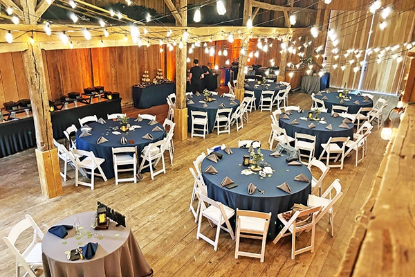 group of round tables on hard wood flooring