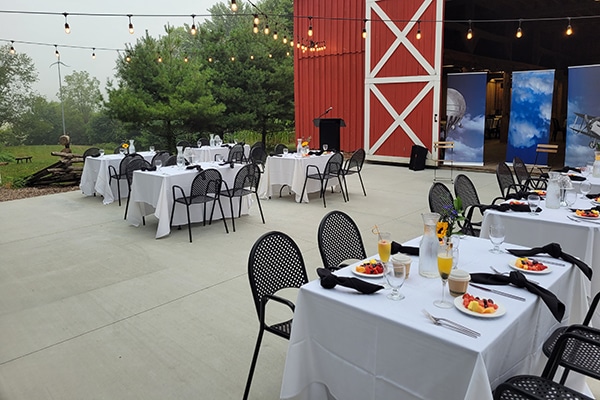 outside view of featherston barn with tables