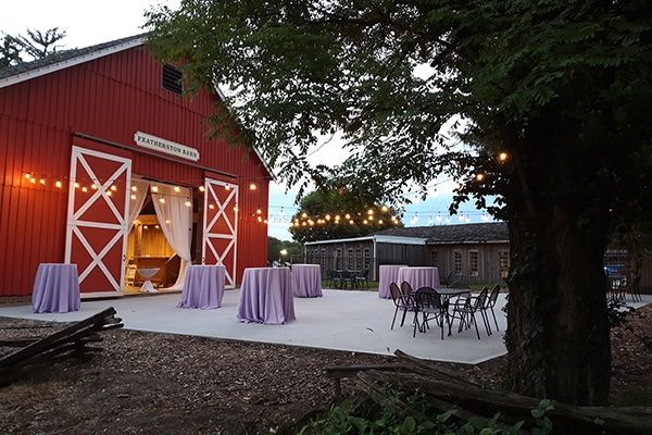 outside view of featherston barn with tables